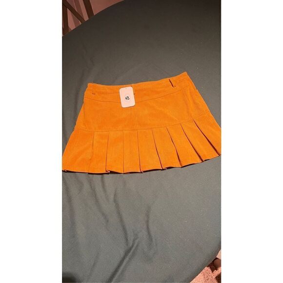 ELODIE PLEATED HEM MINI SKIRT YELLOW (MUSTARD) SIZE L NEW WITH TAGS - Picture 9 of 10
